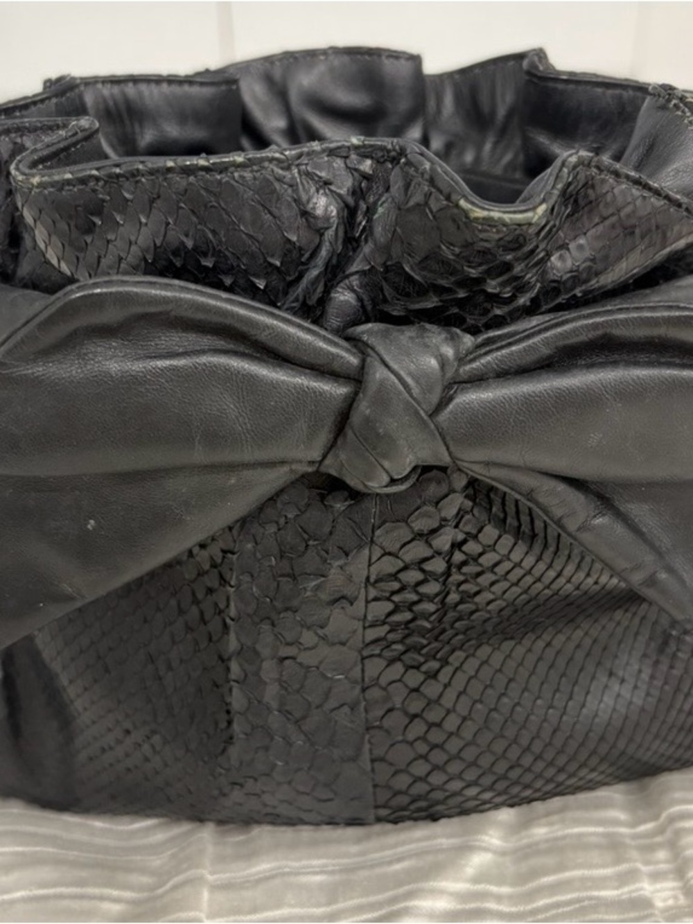 Black Textured Leather Knot-Front Drawstring Clutch
